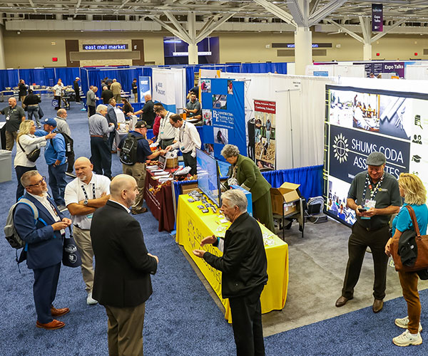 overhead view of 2025 ICC expo showing exhibitors and attendees interacting