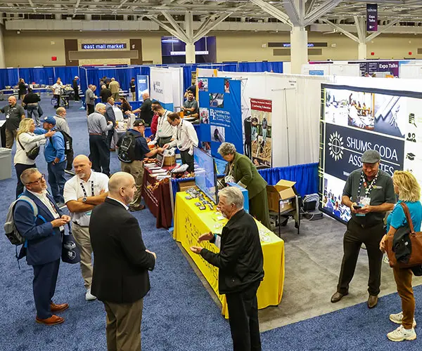 overhead view of 2025 ICC expo showing exhibitors and attendees interacting