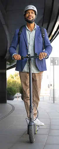 business man on scooter with helmut