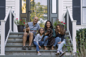 Family in front of their house