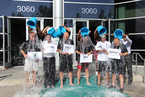 ICC executive team members doused by ICC staff for a good cause.