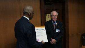Morgan Wheeler (right) being recognized by State of Georgia Representative Billy Mitchell on Building Officials Day.