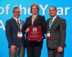 2018 Gerald H. Jones Code Official of the Year Award recipient Christine Rose (center) with ICC Board Immediate Past President Jay Elbettar (right) and ICC Awards Committee Chair Stuart Tom (left).