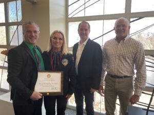 Pictured left to right are Building Official Dale Fletcher, District Representative Teri DuBose, Mayor Andrew Coolidge, and City Manager Mark Sorensen