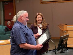 Pictured is Geoff receiving the 2022 Innovation in Code Administration Award