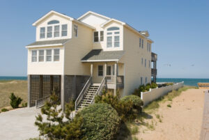 Louisiana Gulf Coast elevated home with ground-level latticework designed to break away during flood events.