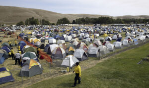 Fire fighters from around the country set up a tent town at the Pomeroy Fairgrounds as they arrive to fight the 32,000 acre School Fire near Pomeroy, Wash. Photo: Jeff T. Green/Getty Images