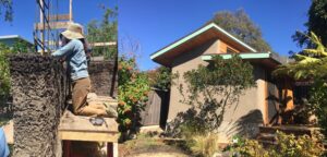 First permitted cob structure in Berkeley, Calif., under construction in 2017 (left) and completed (right).
