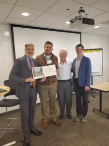 Christopher Landreth (second from left) receives his executive certificate in management and leadership from the Massachusets Institute of Technoloyg’s Sloan School of Management.