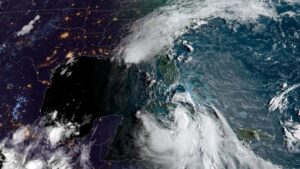 Tropical Storm Marco (top) is weakening as it nears the Gulf Coast in Louisiana, while Tropical Storm Laura (bottom right) is on track to become a hurricane. Photo: NOAA/NESDIS/STAR GOES-East