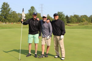 Pictured (left-right): Michael Gardner, Mike Pfeiffer and Chris Ochoa were the first-place team for last year's Annual Ron Burton Golf Outing.