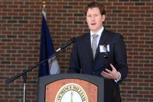 Justin Wiley addresses a group of code professionals, first responders, elected officials and community members at a Building Safety Month gathering in Prince William County, Va.