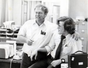 Steve Burger (seated) in 1972 at his first code industry job. Larry (standing), was the plumbing inspector and one of Burger’s first mentors. Burger credits Larry with showing him how important their jobs were and how much fun they could have while making buildings safer. Photo: Steve Burger
