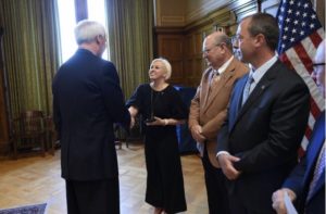 Kelly Sadler shakes hands with Arkansas Governor Asa Hutchinson at the recent Building Safety Month event in the Governor’s office. Sadler is a regional manager for ICC Government Relations.