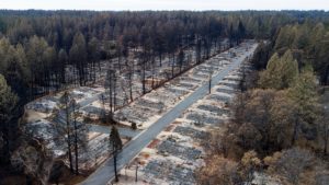 An aerial view of an entire neighborhood decimated by the fire.