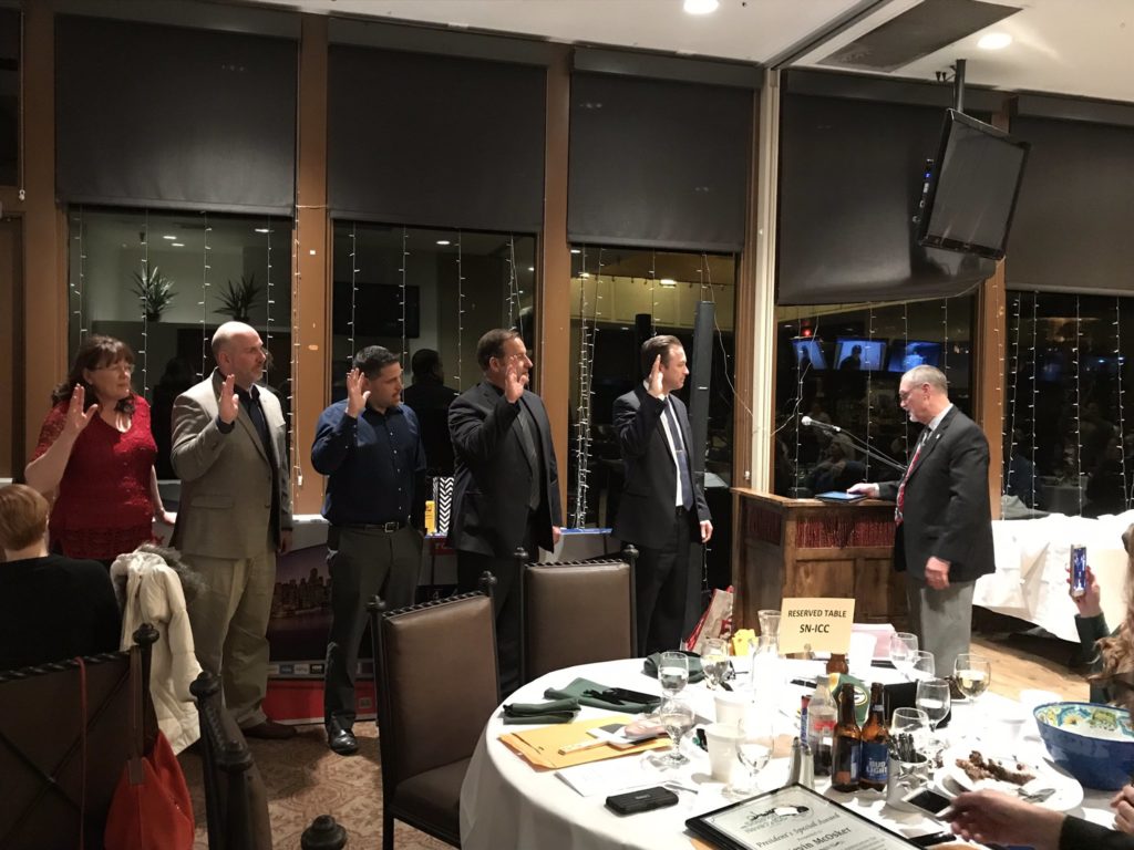 Code Council Board President Greg Wheeler (far right) installing the Southern Nevada Chapter’s 2020 officers at its Annual Installation Banquet.