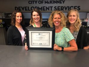 Permit Tech Team at the permit counter of the city of McKinney Building Inspection Department where the quality, timeliness and professionalism all begins under AC251. From left, Kathy Marcussen, Terra Bierschwale, Cheryl Clark and Colleen Miller.