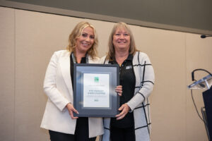 Celine Sarkisloo (left), building code specialist at the city of Glendale in California and Los Angeles Basin Chapter president, accepts the 2021 Chapter Merit Award on behalf of the Los Angeles Basin Chapter from ICC Awards Committee Chair Shirley Ellis (right) during the Chapter Presidents Meeting on Monday, Sept. 20, 2021, in Pittsburgh, Pennsylvania.