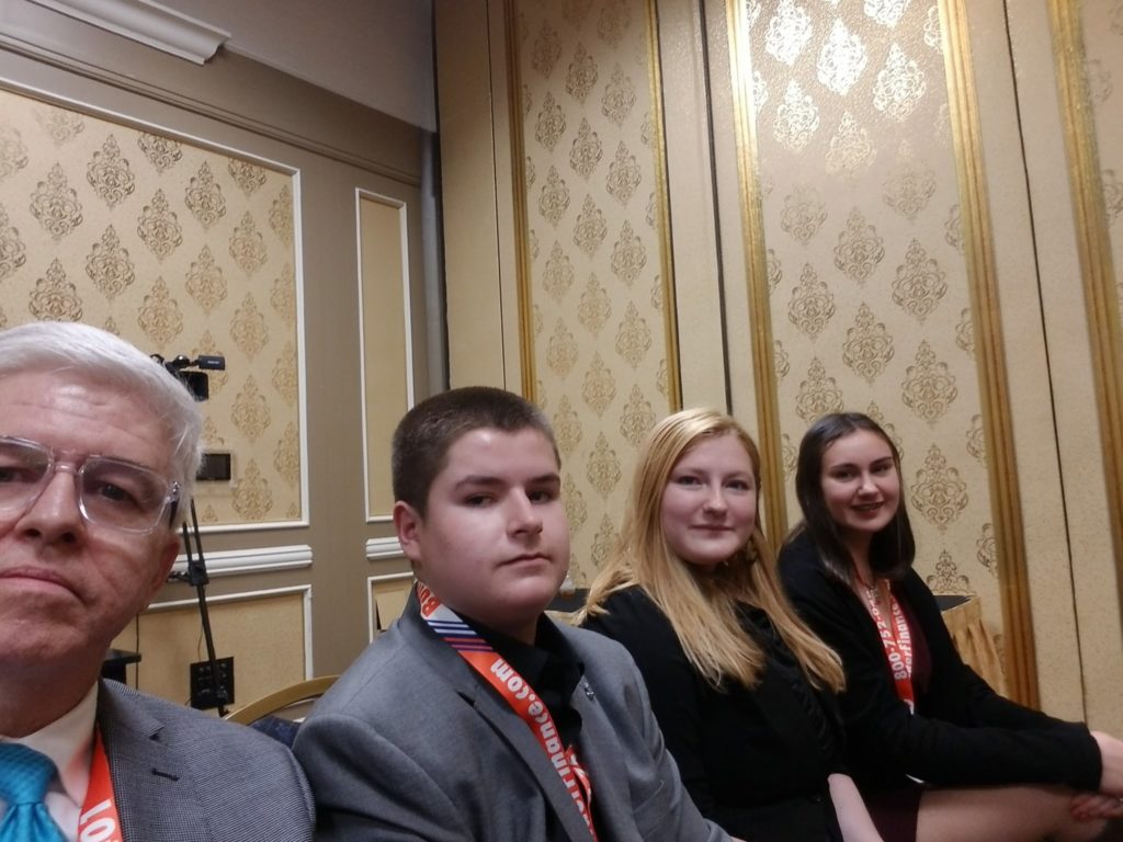 The Colgan High School team shortly before their presentation. From left, Colgan High School Technology Education Instructor Tim Mason, and students Jacob Winebarger, NAHB Student Chapter Vice President Josalyn Dyer and NAHB Student Chapter President Ariel Meyer.