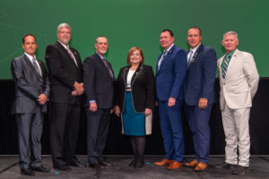 Four senior officers were elected to the executive committee and two sectional and three at-large directors were elected or re-elected by eligible members to the 2019–2020 board during the Annual Business Meeting on Oct. 21, 2019. From left: At-Large Director Steve McDaniel, Section F Director Alan Boswell, President Greg Wheeler, Vice President Cindy Davis, Secretary/Treasurer Michael Wich, Section C Director Tom Peterson, and At-Large Director Michael L. Savage, Sr. Not pictured: Immediate Past President William R. Bryant and At-Large Director Mike Boso.