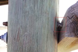 Photo 3. The old bolt is severely corroded and reduced in diameter compared with the newer stainless steel bolt below.