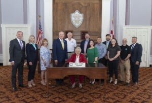 International Code Council Chief Executive Officer Dominic Sims (far left) attended a ceremony on May 21, 2021, where Alabama Governor Kay Ivey signed a proclamation recognizing May as Building Safety Month in Alabama.