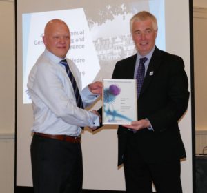 Grant Tierney (left) of the Aberdeen City Council being presented the inaugural Buildings Standards Community and Building Safety Award by Stephen Garvin of the Building Standards Division.